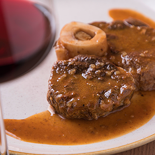 Ossobuco di manzo in umido con risotto alla milanese Vinheria Percussi Delivery